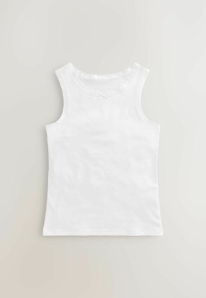 Top senza maniche bianco con scollatura a zig zag, un piccolo dettaglio a fiocco e una texture di cotone morbida.