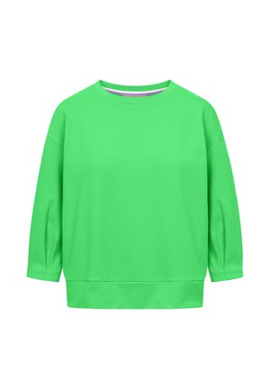 Jasnozielona bluza z długim rękawem i okrągłym dekoltem, o swobodnym kroju i szerokim obszyciu, prezentowana na jednolitym białym tle.