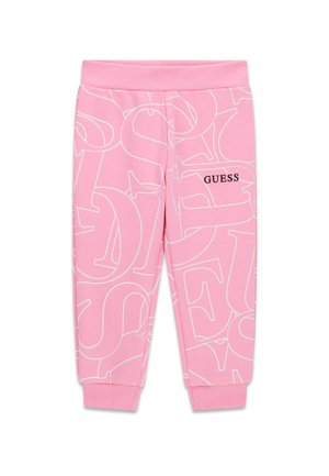 Rosa Kinder-Jogginghose mit weiß umrandeten Buchstaben und schwarzem "GUESS"-Logo am rechten Bein, elastischem Bund und Bündchen.