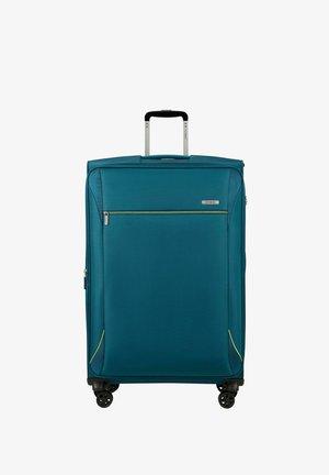 Grande valise souple de couleur bleu sarcelle avec quatre roues pivots noires, une poche avant zippée et une poignée télescopique noire étendue.