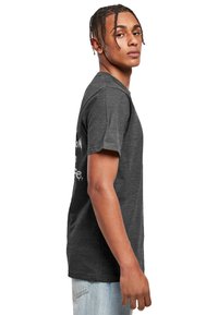 Merchcode UNFOLLOW  - Triko s potiskem - charcoal