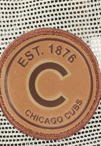 Brown leather patch features "C" logo with "EST. 1876" and "CHICAGO CUBS" text, set against a white mesh background.