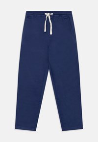 Pantalons bleu marine en tissu doux, avec une taille élastique, un cordon de serrage et des poches latérales, présentent une coupe droite.