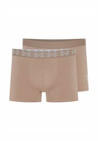 Beżowe bawełniane bokserki z wzorzystym pasem w białe akcenty. Gładka tekstura, średni stan i dopasowany krój.