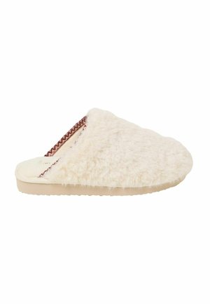 Fuzzy cream-colored slipper with a soft texture, rounded shape, and brown accent stitching along the edge. Flat sole for comfort.
