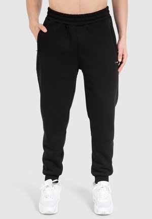 Smilodox CASUAL SPORT FIERO - Træningsbukser - schwarz
