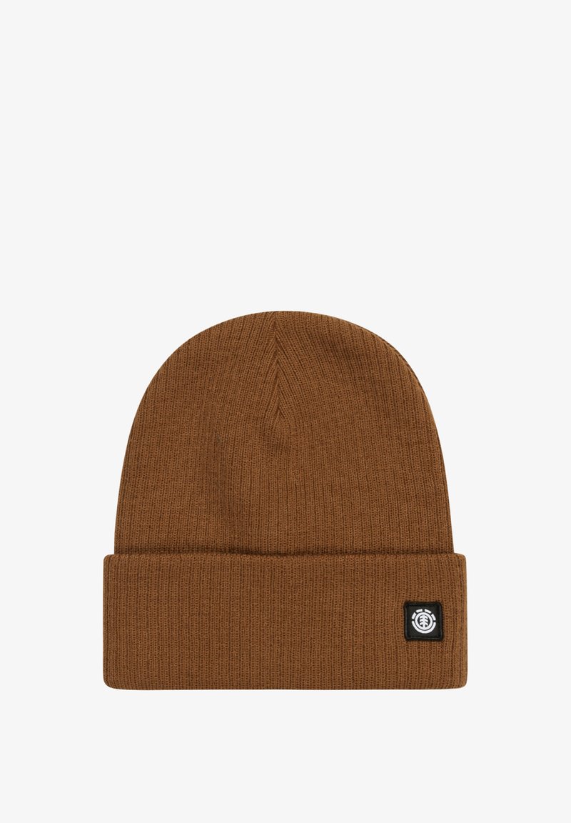 Brown knitted beanie with a folded cuff. Features a rectangular black tag with a logo on the side. Soft texture and snug fit.
