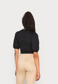 Monki Blusa - black dark