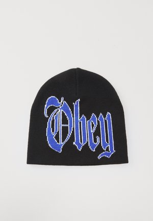 Fekete kötött sapka, nagy kék és fehér "Obey" logóval, texturált felülettel és bordázott széllel.