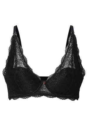 Soutien-gorge en dentelle noire avec des bonnets souples, de larges bords à volants, des bretelles ajustables et un bouton décoratif au centre. Présente des motifs en dentelle élaborés.