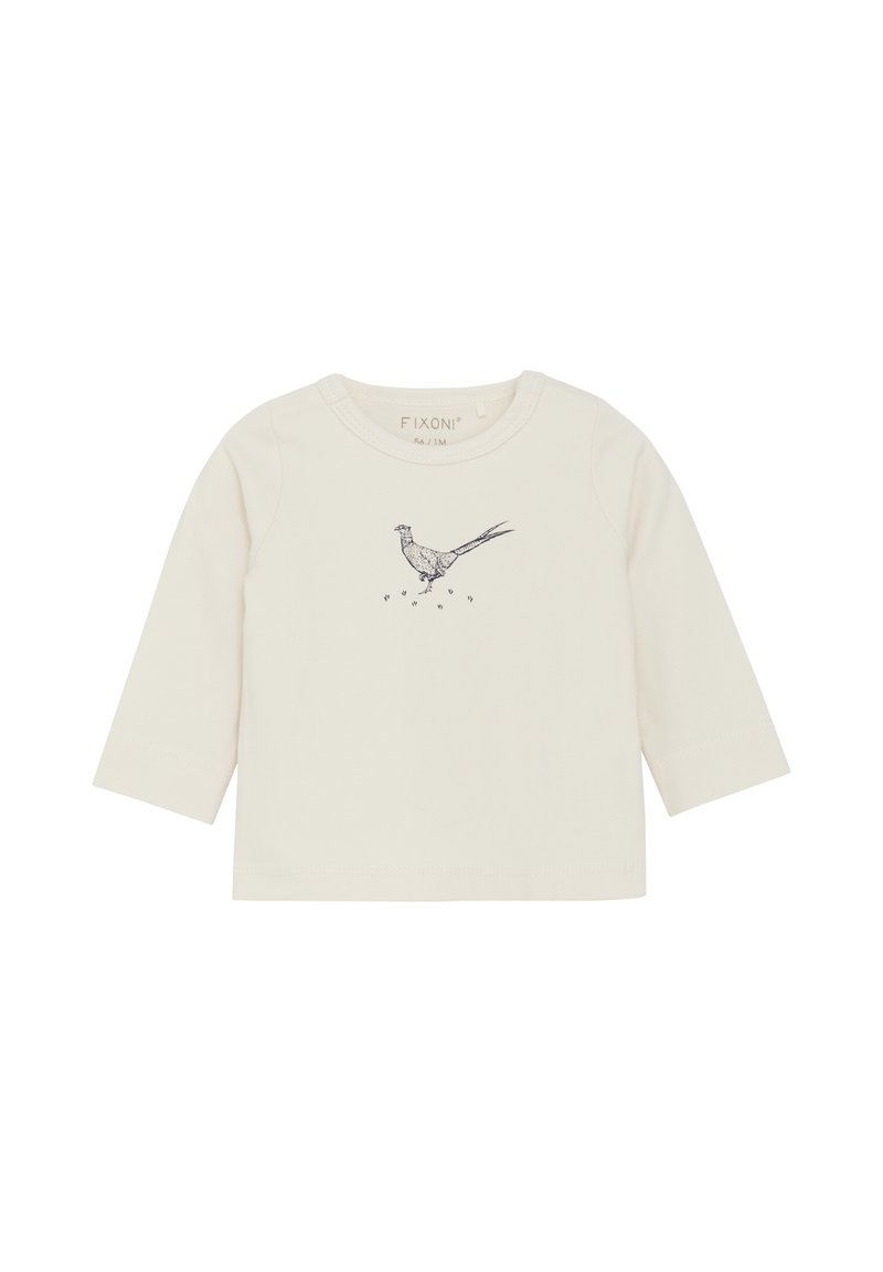 Creme katoenen blouse met lange mouwen, met een blauwe vogelillustratie op de voorkant. Eenvoudige ronde halslijn, zachte textuur en geen zichtbare sluitingen.
