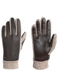 Brune læderhandsker med en lys beige strikket manchet, der har en glat tekstur og en subtil sømdetalje, designet til varme og komfort.