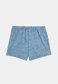 Pantalones cortos infantiles de tela azul claro, con un estampado de dinosaurios en azul oscuro. Cintura elástica, corte sencillo y sin bolsillos.