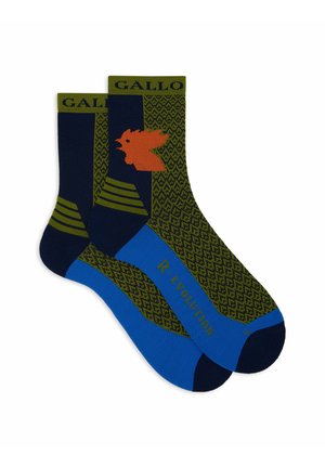Calzettoni multicolori con un motivo blu e verde, una grafica di un uccello arancione e dettagli blu. Realizzati in un materiale morbido e testurizzato.