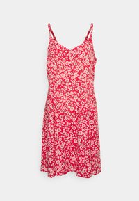 Blommig klänning i röd med vita små blommönster. Har justerbara spaghettistropper och en figurnära liv med en utställd kjol.