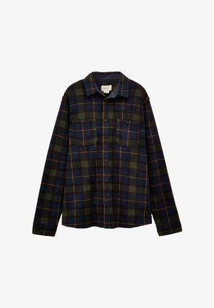 Chemise en flanelle à carreaux dans des tons de vert foncé, bleu marine et jaune. Dotée d'un devant à boutons, de deux poches poitrine et d'un col classique. Texture douce.