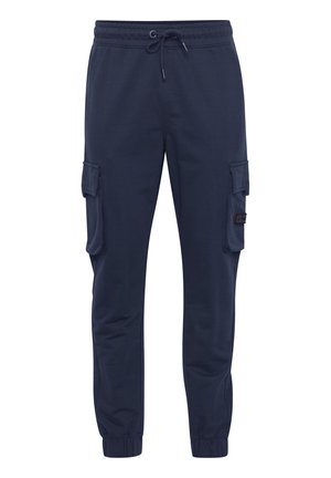 Pantalones de chándal cargo azul marino con cintura elástica y cordón, que cuentan con dos bolsillos laterales y puños acanalados. Tela suave de mezcla de algodón.