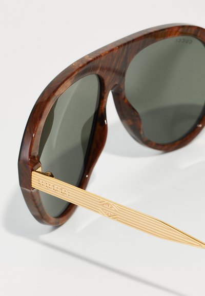 Gucci UNISEX - Óculos de sol - black/gold-coloured