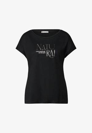 Schwarzes T-Shirt mit kurzen Ärmeln und lockerer Passform, mit metallischem Schriftzug "NATURAL" sowie zusätzlichem Text darunter. Aus weichem Baumwollmaterial.