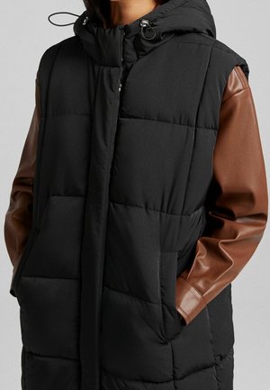 Smanicato - black