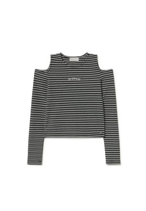 Haut à manches longues rayé noir et blanc avec découpes aux épaules et col arrondi. Présente un logo sur la poitrine et un design court.