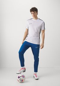 Nike Performance DRI-FIT ACADEMY PANT - Donji dijelovi trenirke - court blue/aquarius blue