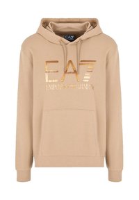 Felpa beige con cappuccio e lacci, dotata di un logo EA7 dorato metallizzato sulla parte anteriore e una tasca a marsupio. Materiale morbido con polsini a coste.