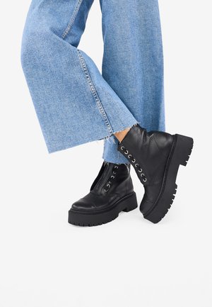 Botines con plataforma - black