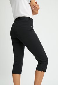 Röhnisch Pantalón 3/4 de deporte - black