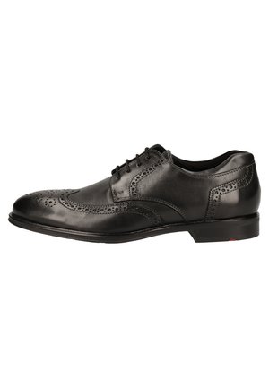 Black leather dress shoe with brogue detailing, lace-up design, rounded toe, smooth texture, and a slight heel.
