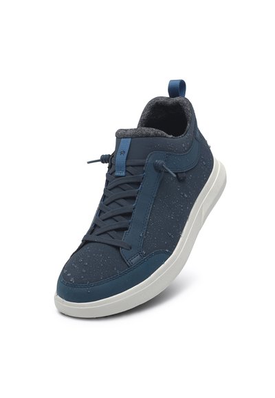 Water-resistant navy sneaker with gray accents; features a padded collar, textured surface, and a white rubber sole. Adjustable lace system.