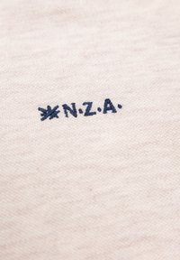 Poloshirt - light cream