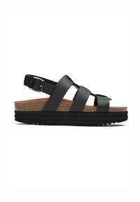 Black leather sandal with three straps, cork midsole, and black rubber outsole, featuring a buckle for adjustment on the ankle strap.