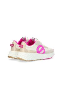 Sneakers with a textured beige upper, pink accents, and a white chunky sole featuring a geometric pattern and colorful speckles.