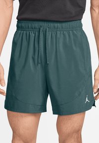 Jordan Korte sportsbukser - oxidized green
