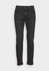 Zwarte denim jeans met een slim fit, voorzien van vijf zakken, riemlussen en subtiele stiksels. Versleten textuur over de stof.