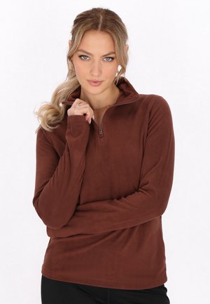 Bruine fleece pullover met een hoge kraag en een halve rits. Heeft lange mouwen en een zachte textuur, ideaal voor layering.