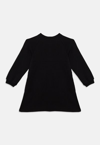 Robe noire à manches longues coupe trapèze avec col rond et manches raglan, présentée à plat sur un fond gris clair.