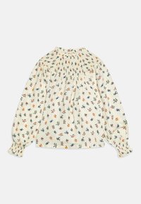 Blusa floreale in crema con scollo arricciato e maniche lunghe. Presenta piccoli motivi floreali multicolori e polsini elastici. Tessuto morbido.