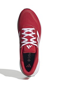 Red athletic shoe with mesh upper, white laces, and three white stripes. Features cushioned insole and rubber outsole.