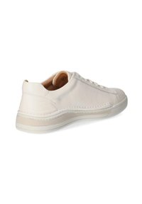 Baskets en cuir blanc avec bout rond, coutures ton sur ton et semelle intermédiaire texturée. L'intérieur est doublé d'un matériau beige pour plus de confort.
