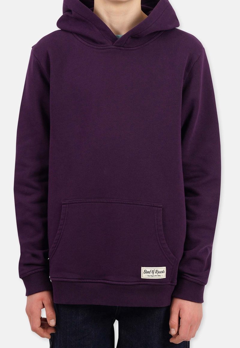 Sudadera con capucha morada, hecha de tejido suave, que cuenta con un bolsillo frontal y puños de canalé. Etiqueta de marca cosida en la parte inferior derecha.
