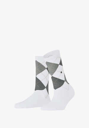 Weiße Socken mit einem gemusterten Design aus grünen und grauen Rauten, akzentuiert mit goldfarbener Stickerei und einem kleinen Logodetail am Bund.