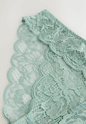 Mintgrønt blonderstof med bølget kant, der indeholder indviklede blomsterprint og fint netdetalje. Blød, tekstureret overflade.