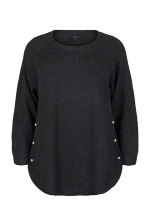 Melna adīta džemperis ar noapaļotu apkakli, garām piedurknēm un pogu akcentiem apakšmalā. Mīksta, teksturēta auduma, ar brīvu piegriezumu.