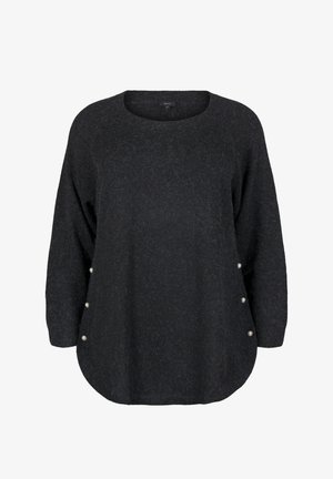 Melna adīta džemperis ar noapaļotu apkakli, garām piedurknēm un pogu akcentiem apakšmalā. Mīksta, teksturēta auduma, ar brīvu piegriezumu.