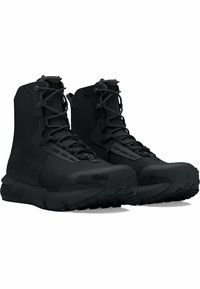 Black hiking boots with a textured upper, reinforced toe cap, and Vibram outsole. Features durable laces and high ankle support.