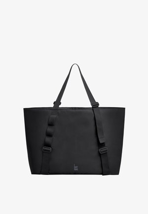 Sac fourre-tout rectangulaire noir avec deux bretelles d'épaule réglables et logo "GOT BAG." centré près du bas.