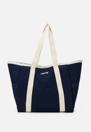 Grand sac cabas bleu foncé avec anses et bordures crème, présentant le logo Levi's au centre à l'avant.