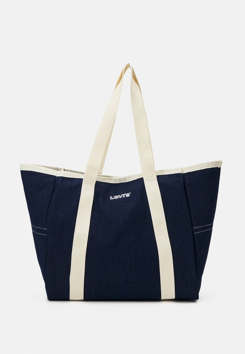 Grand sac cabas bleu foncé avec anses et bordures crème, présentant le logo Levi's au centre à l'avant.